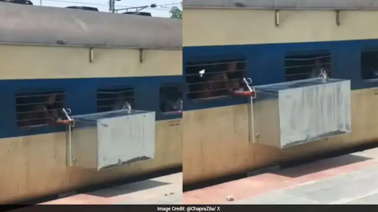 Train से बाहर लटका बड़ा लोहे का ट्रंक, रेलवे ने लिया एक्शन; वीडियो वायरल